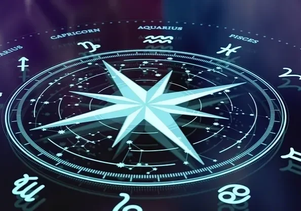 A glowing compass rose surrounded by zodiac symbols on a dark background.
